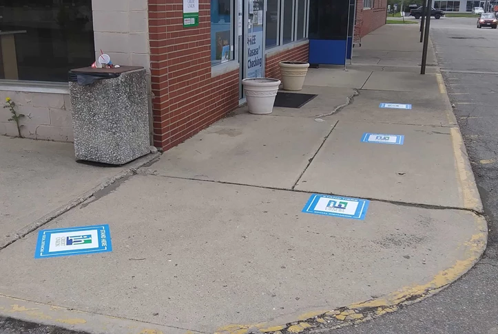 Social Distancing Floor Graphics for Credit Union Exterior
