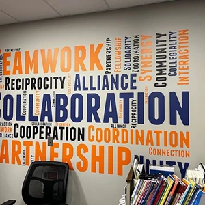 Word Cloud signages printed on vinyl, custom cut and installed as wall graphics in Conference Room